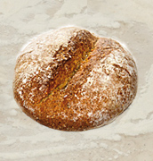 detall d'un pa amb simbols del forn de pa altarriba